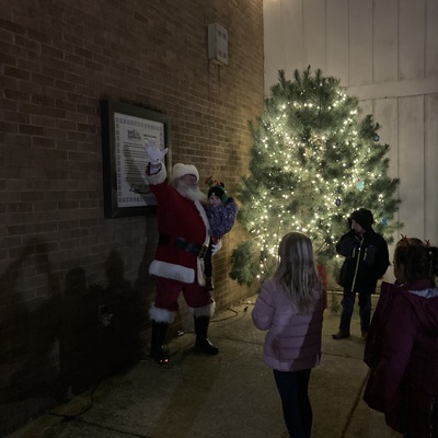 Santa lighting the Community Christmas Tree